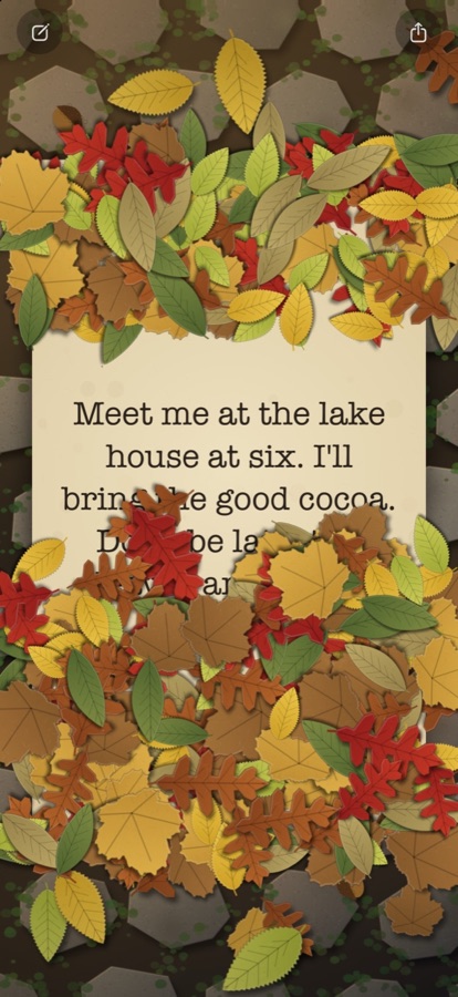 iPhone: a note half uncovered under cut-paper autumn leaves